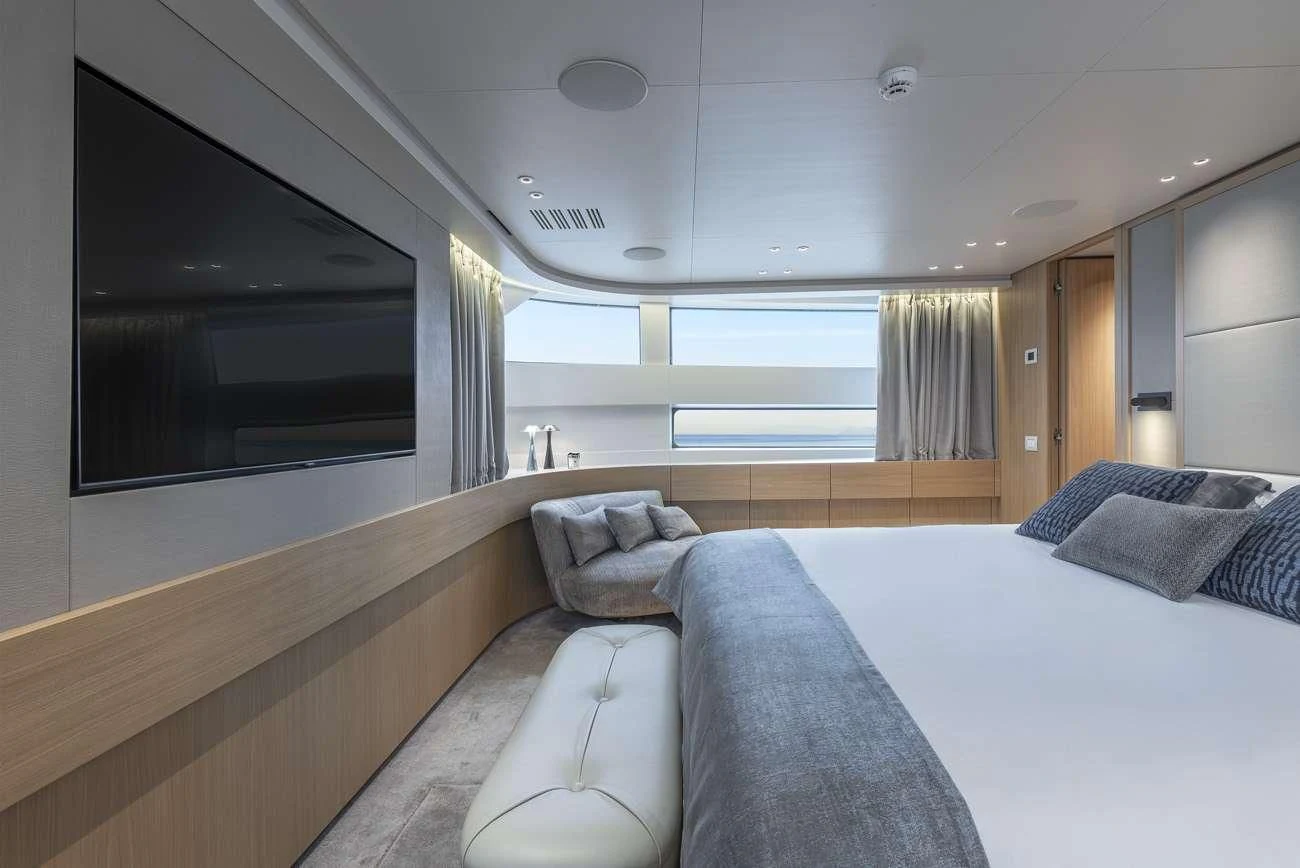 a room with a bed and a couch aboard FATSA Yacht for Sale