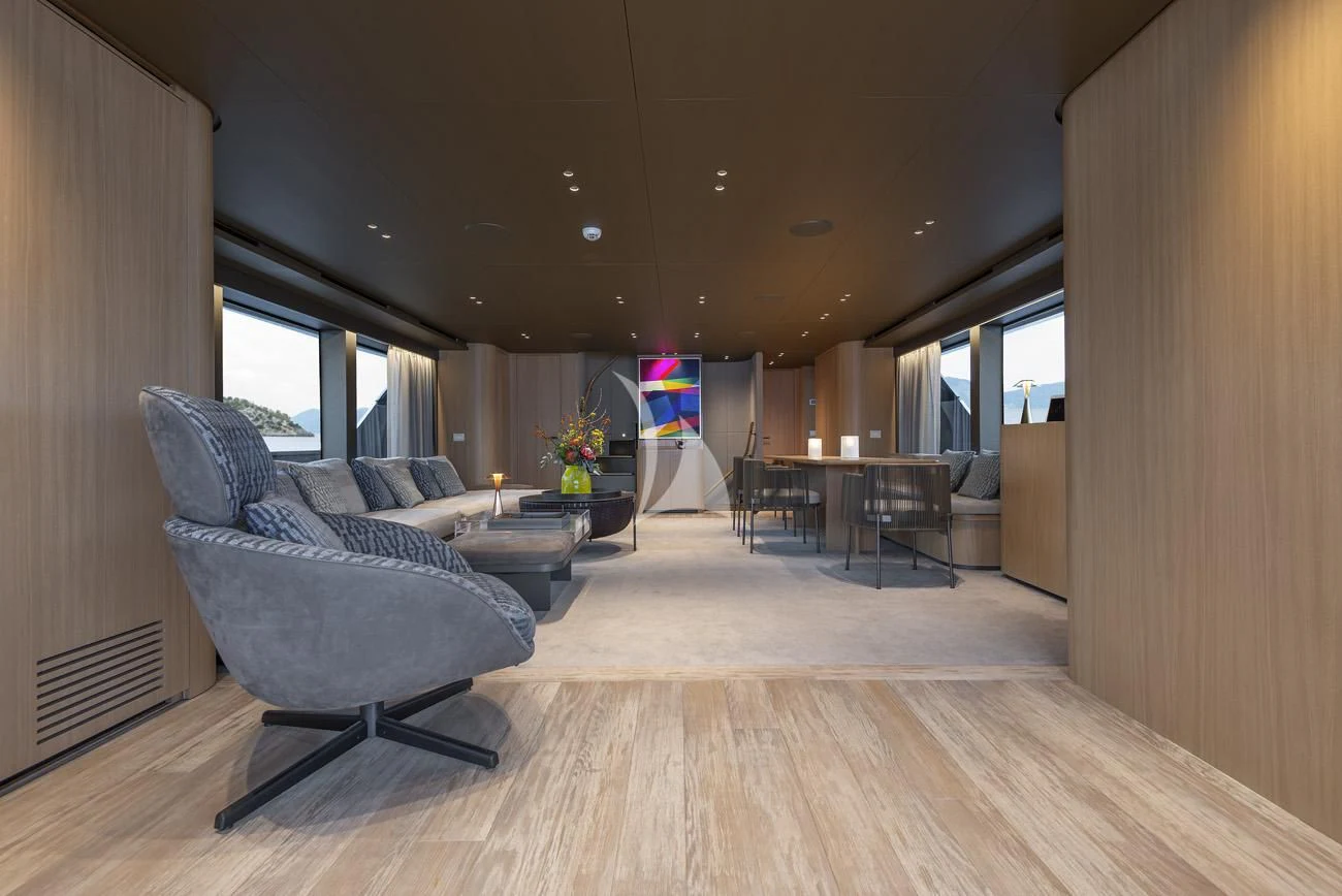 a living room with a wood floor aboard FATSA Yacht for Sale