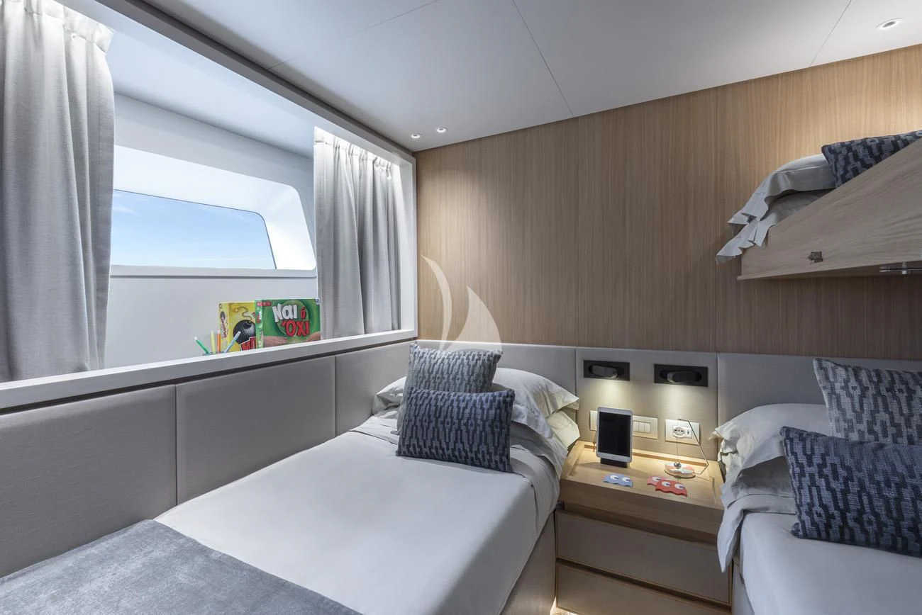 a room with a bed and a window aboard FATSA Yacht for Sale