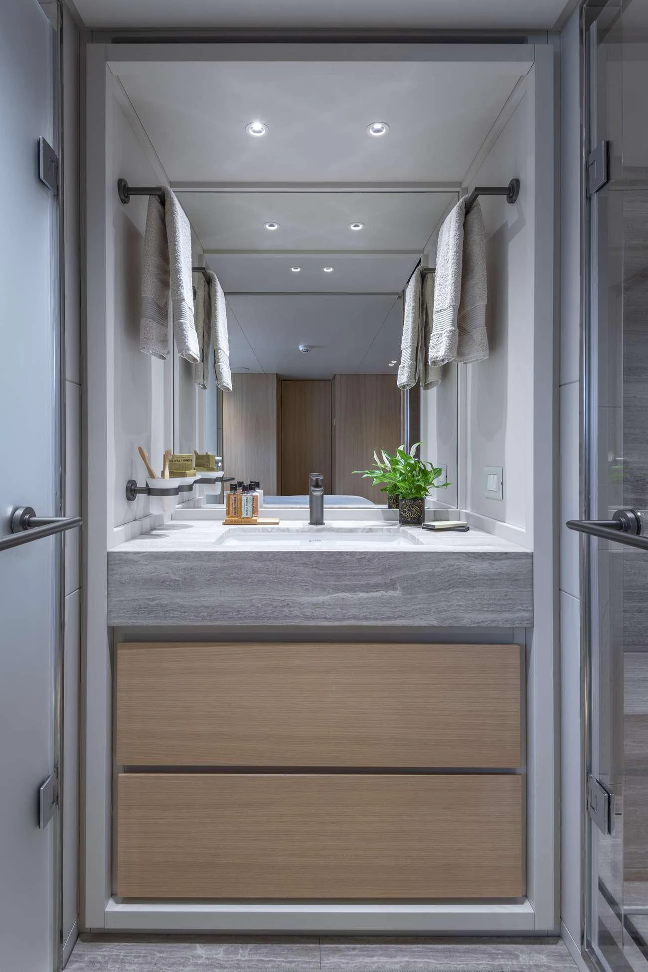 a bathroom with a large mirror aboard FATSA Yacht for Sale