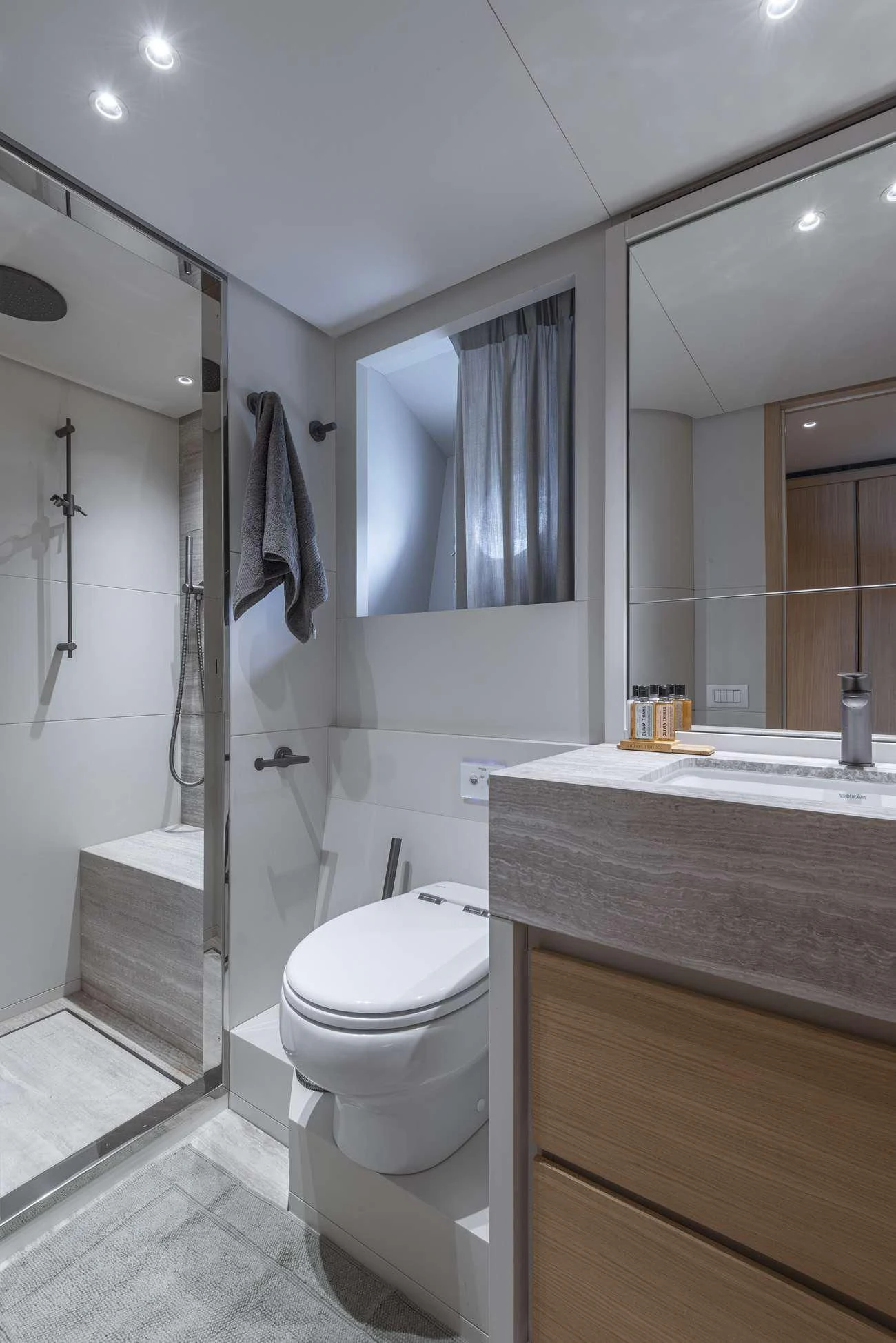 a bathroom with a shower and toilet aboard FATSA Yacht for Sale