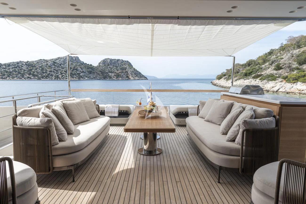 a room with a table and chairs aboard FATSA Yacht for Sale