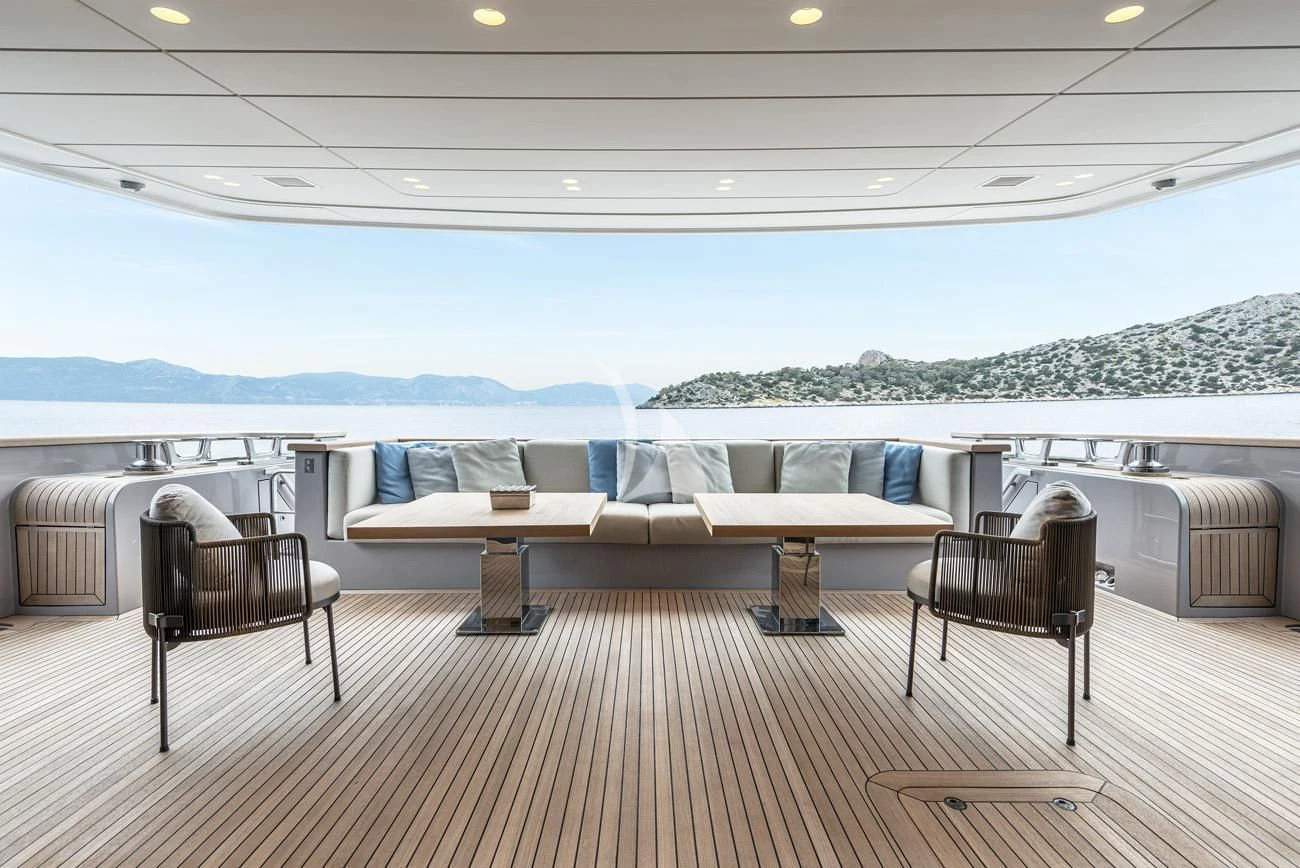 a room with a couch and a table and chairs aboard FATSA Yacht for Sale
