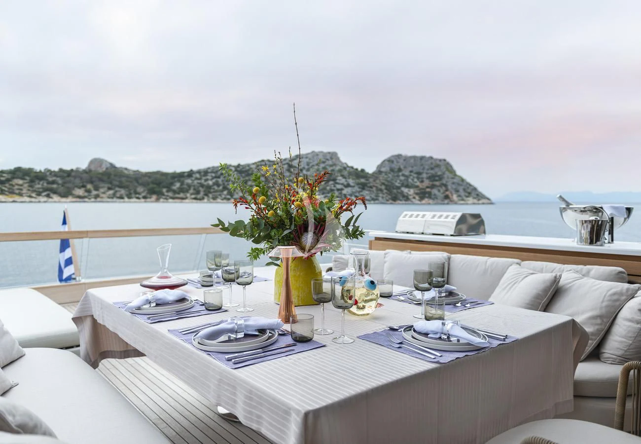 a table set for a dinner aboard FATSA Yacht for Sale