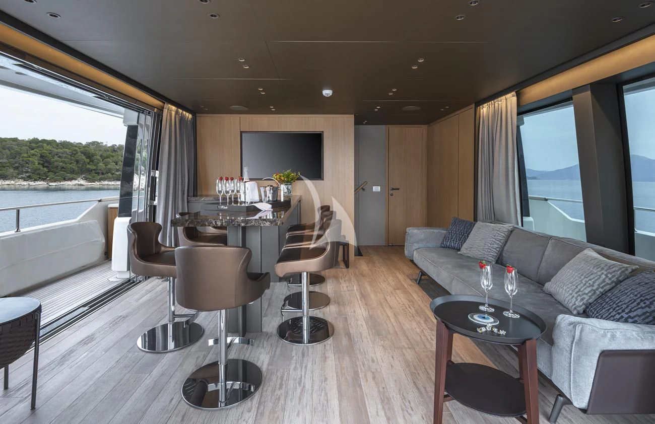a living room with a couch and a table aboard FATSA Yacht for Sale
