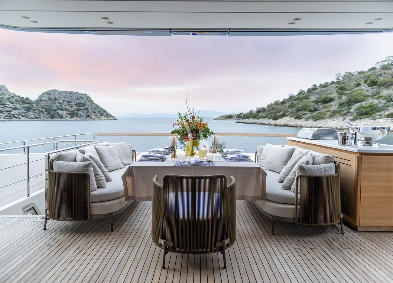 a room with a table and chairs aboard FATSA Yacht for Sale