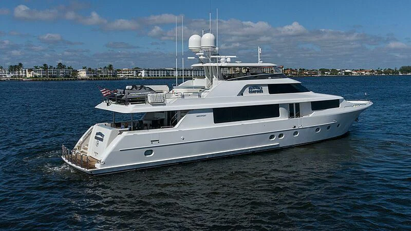 a white yacht in the water aboard AMAZING GRACE Yacht for Sale