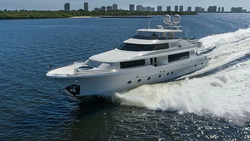 a white yacht on the water aboard AMAZING GRACE Yacht for Sale