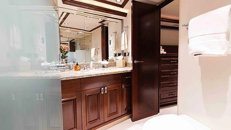 a bathroom with a sink and a mirror aboard AMAZING GRACE Yacht for Sale