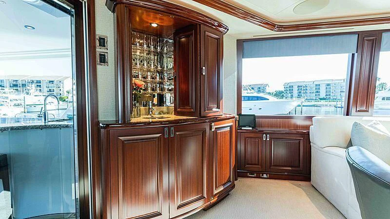 a room with a large window and a view of a city aboard AMAZING GRACE Yacht for Sale