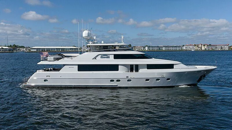a white yacht in the water aboard AMAZING GRACE Yacht for Sale