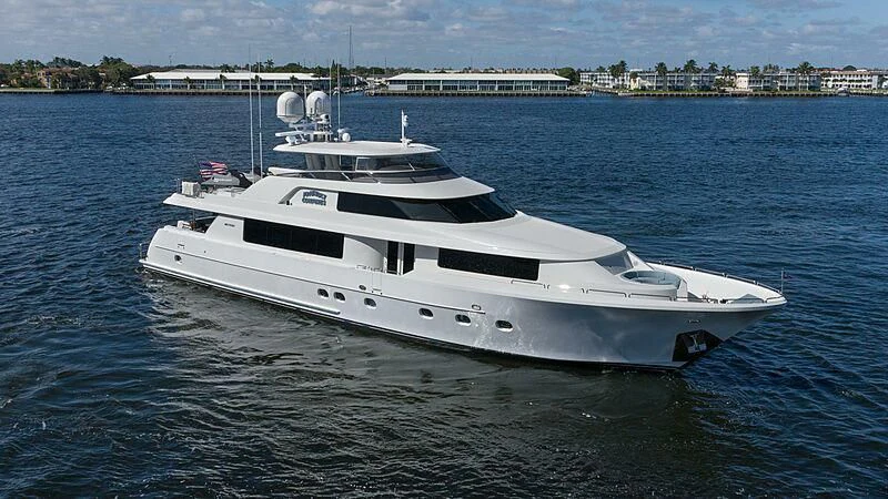 a white yacht in the water aboard AMAZING GRACE Yacht for Sale
