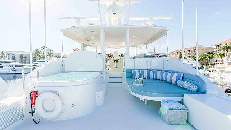 a large white tent with blue seats aboard AMAZING GRACE Yacht for Sale