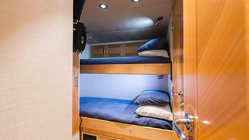 a room with bunk beds aboard AMAZING GRACE Yacht for Sale