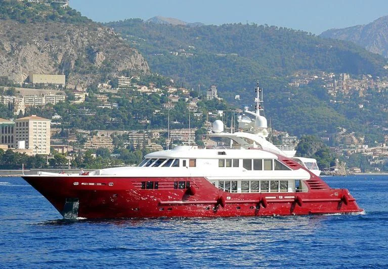 a red and white boat on water aboard LEDRA Yacht for Sale