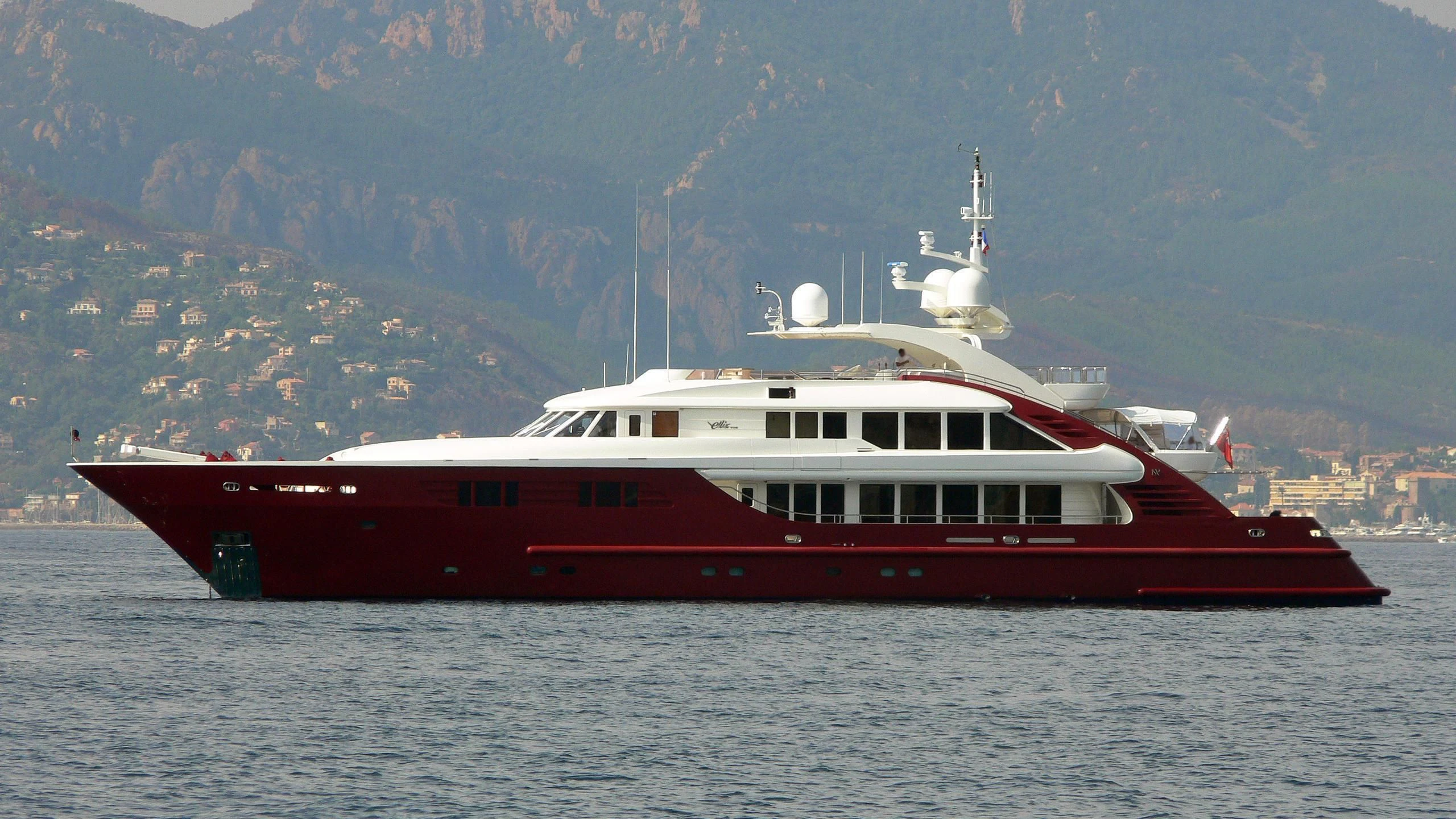a red and white boat on water aboard LEDRA Yacht for Sale