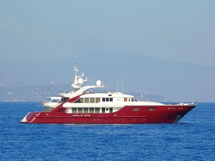 a red and white boat in the water aboard LEDRA Yacht for Sale