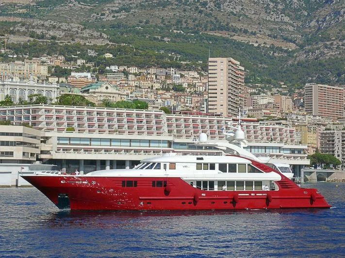a red and white boat on water aboard LEDRA Yacht for Sale