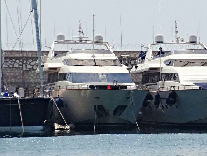 several boats docked at a pier aboard MONTE CARLO Yacht for Sale