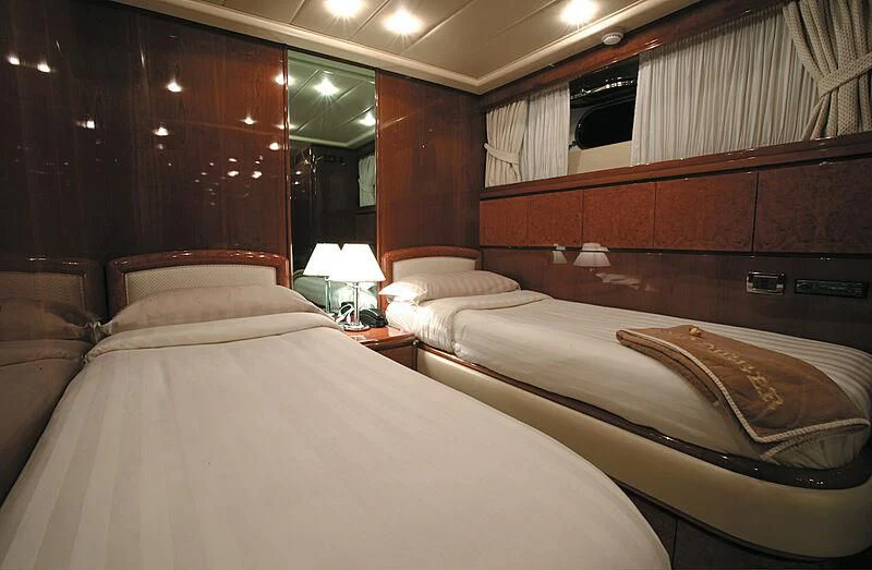 a room with two beds aboard MONTE CARLO Yacht for Sale
