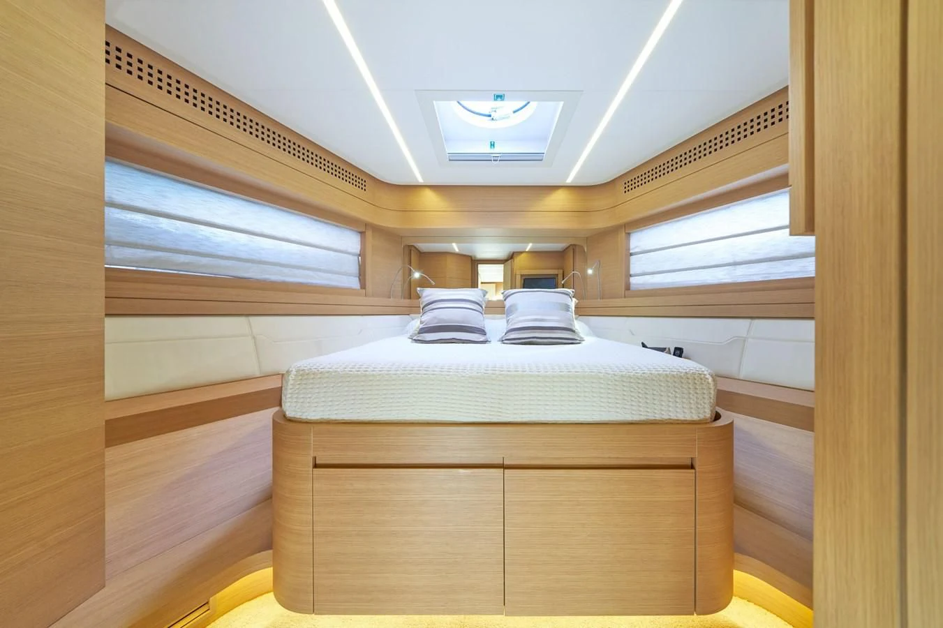 a bed in a room aboard HIT Yacht for Sale