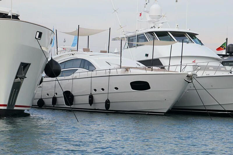 a couple of white yachts aboard HIT Yacht for Sale