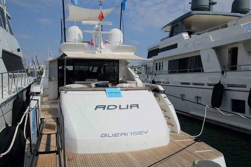 a couple of boats docked aboard HIT Yacht for Sale