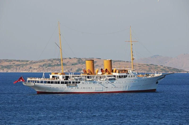 a large white boat in the water aboard SAVARONA Yacht for Sale