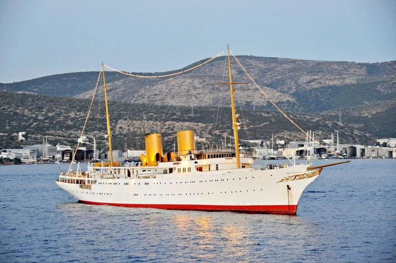 a large white boat in the water aboard SAVARONA Yacht for Sale