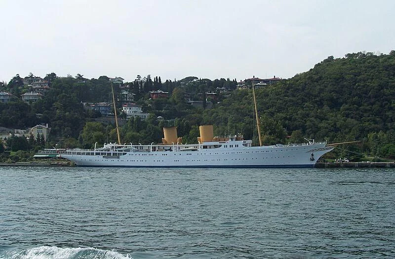 a large ship in the water aboard SAVARONA Yacht for Sale