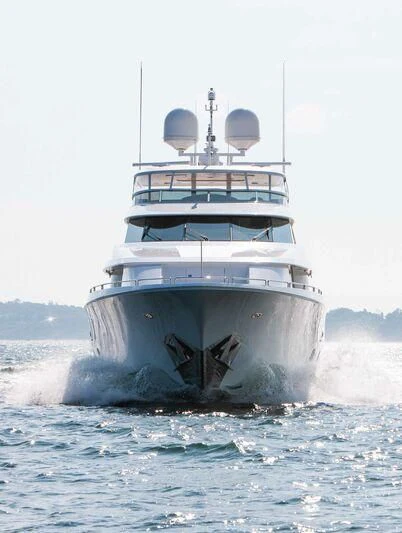 a large ship in the water aboard BRAVEHEART Yacht for Sale