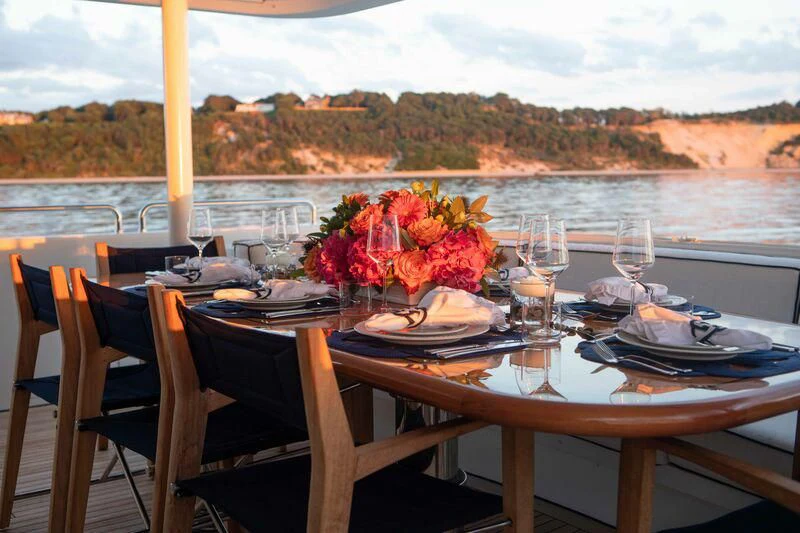 a table set for a meal aboard BRAVEHEART Yacht for Sale