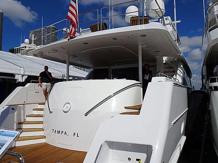 a boat with a couple of people on it aboard BRAVEHEART Yacht for Sale