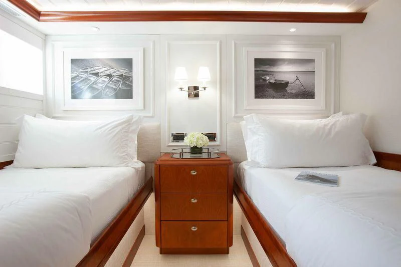 a room with two beds aboard BRAVEHEART Yacht for Sale