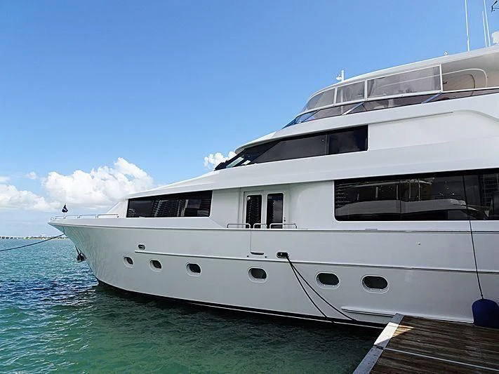 a large white yacht on the water aboard BRAVEHEART Yacht for Sale