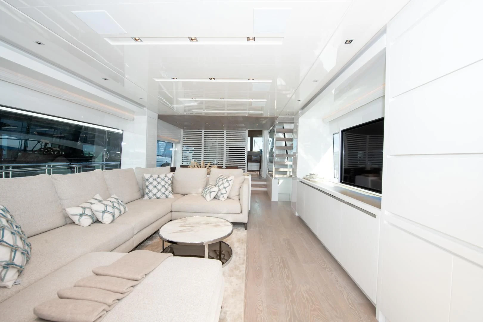 a living room with a couch and a table aboard MARAVI Yacht for Sale