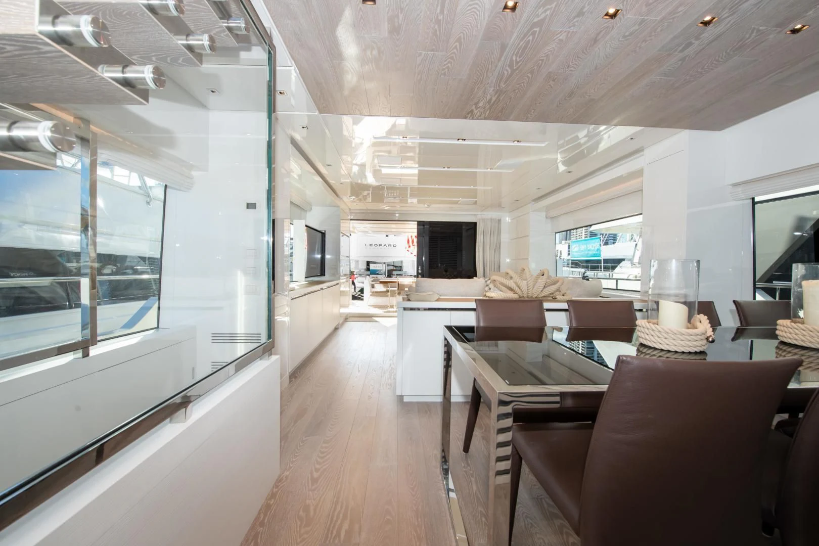 a room with a table and chairs aboard MARAVI Yacht for Sale