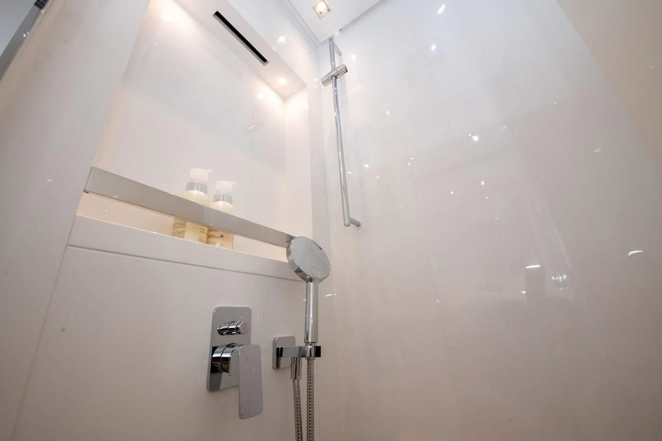 a white wall with a light switch aboard MARAVI Yacht for Sale