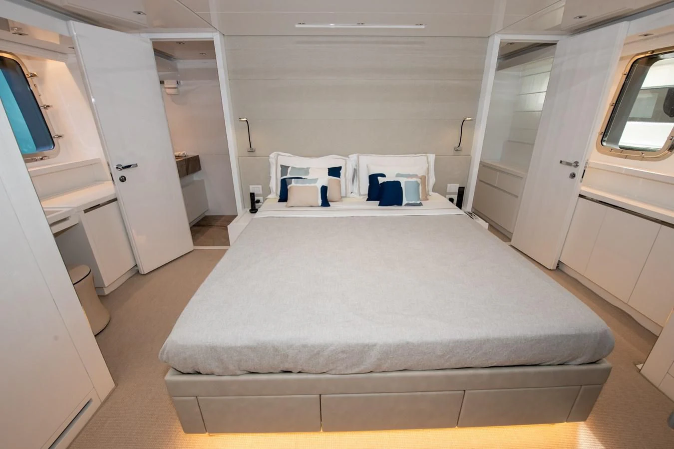 a room with a bed and a window aboard MARAVI Yacht for Sale