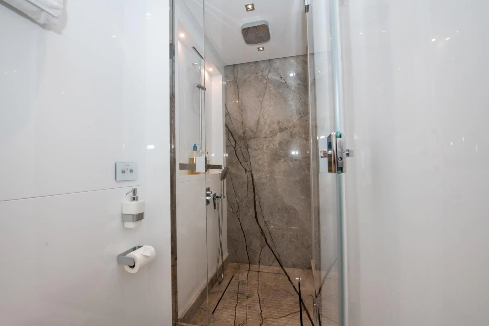 a shower unit in a bathroom aboard MARAVI Yacht for Sale