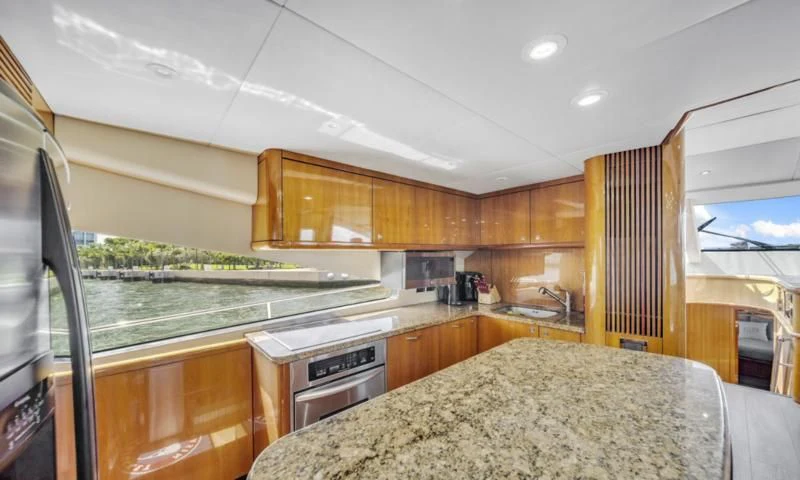 a kitchen with a marble counter top aboard FINS UP Yacht for Sale