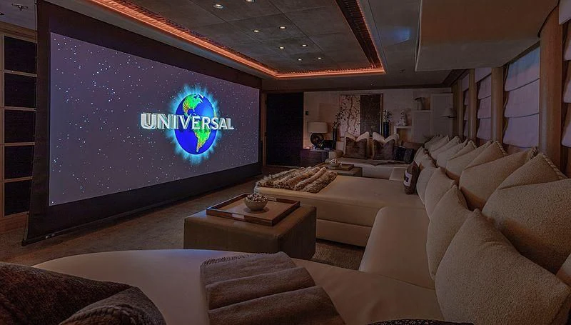 a large screen in a living room aboard KOJU Yacht for Sale