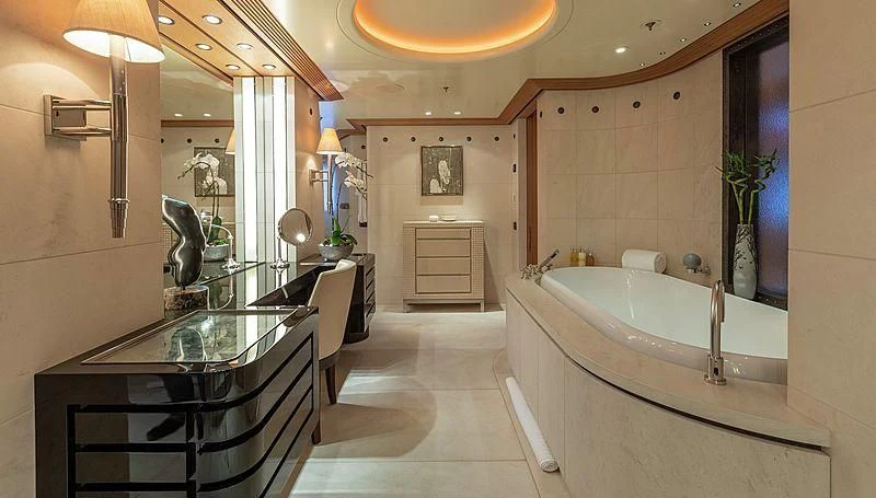 a bathroom with a large bathtub aboard KOJU Yacht for Sale