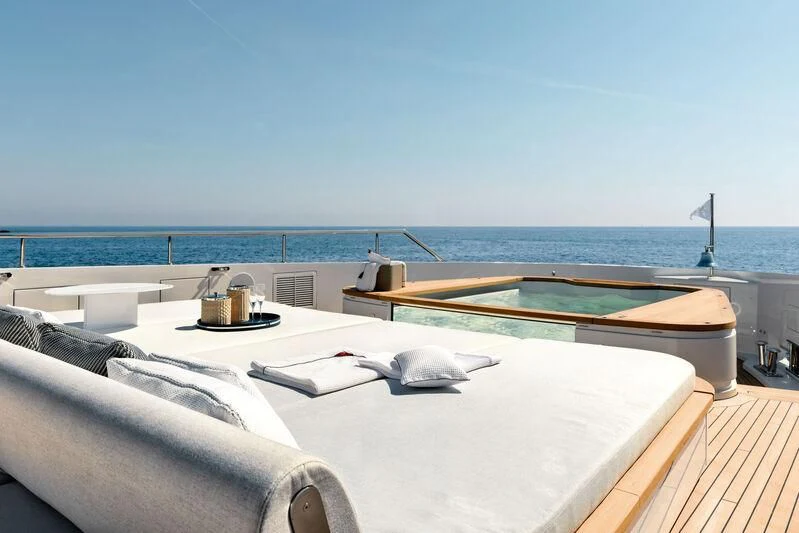 a pool on a deck overlooking the ocean aboard KOJU Yacht for Sale