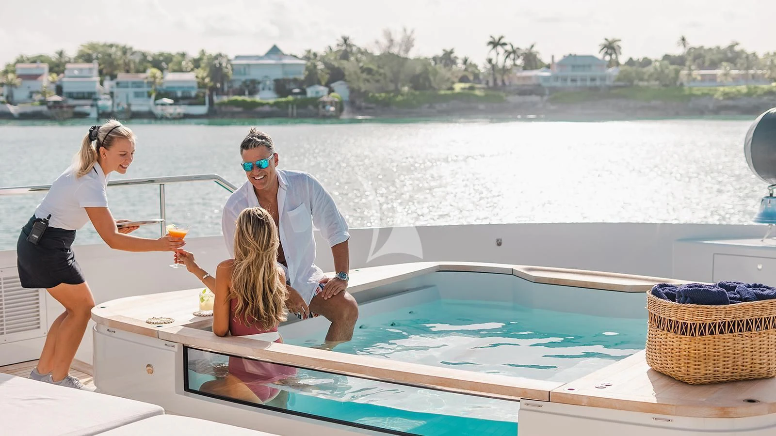 a group of people on a boat aboard KOJU Yacht for Sale