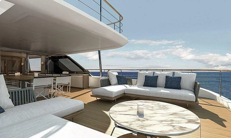 a large living room with a large balcony aboard KOJU Yacht for Sale