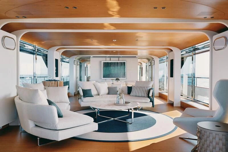 a living room with a large window aboard KOJU Yacht for Sale
