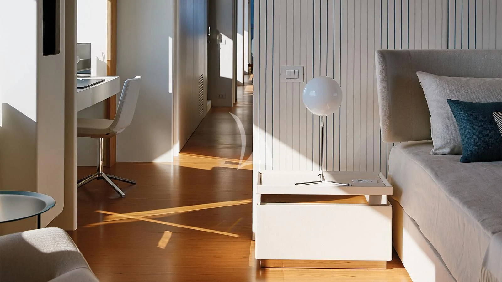 a room with a bed and a desk aboard KOJU Yacht for Sale