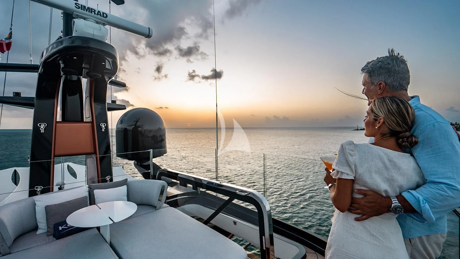 a man and woman on a boat aboard KOJU Yacht for Sale