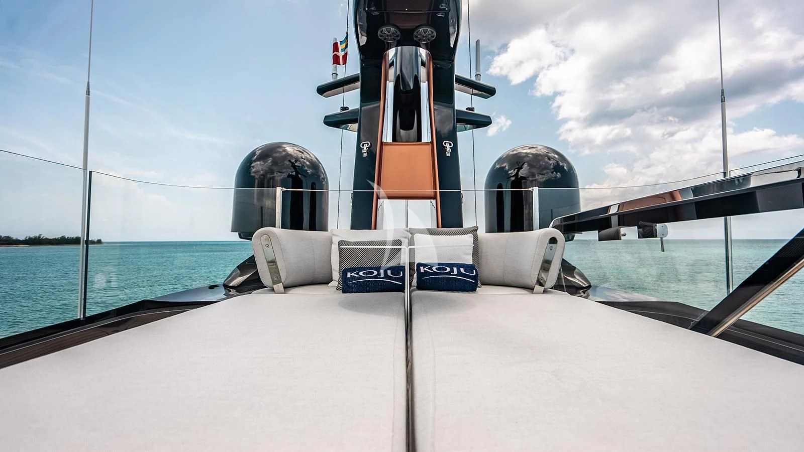 a boat with a satellite dish on it aboard KOJU Yacht for Sale